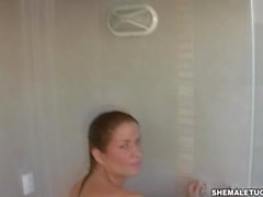 Perlla Felix jerks off big dick in Tugjob in the Shower