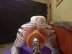 Sex-machine fucks ass in striped leggings