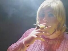 Tgirl Virginia smoking a big cigar