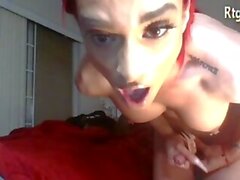 redhead american tranny with big tits plays with her big banana cock on webcam
