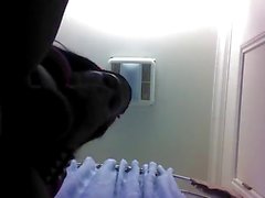 Ebony TG stroking huge cock in bathroom