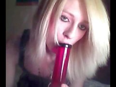 Platinum blonde emo tgirl does a bit of softcore posing